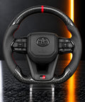 Toyota GR — Carbon Fibre Steering Wheel, Red Stitch